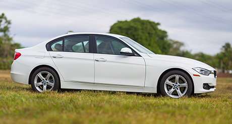 Resized car parked on grass iStock
